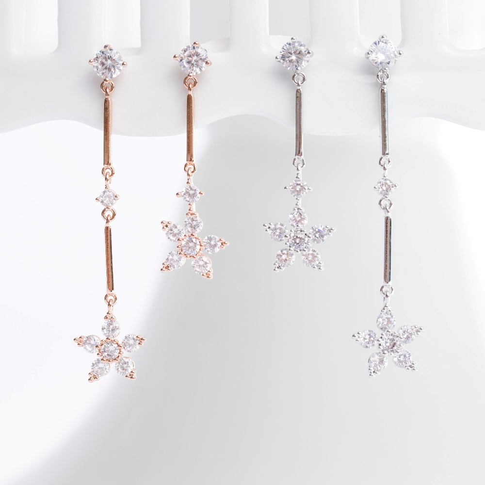 Rose gold and silver unbalanced crystal earrings